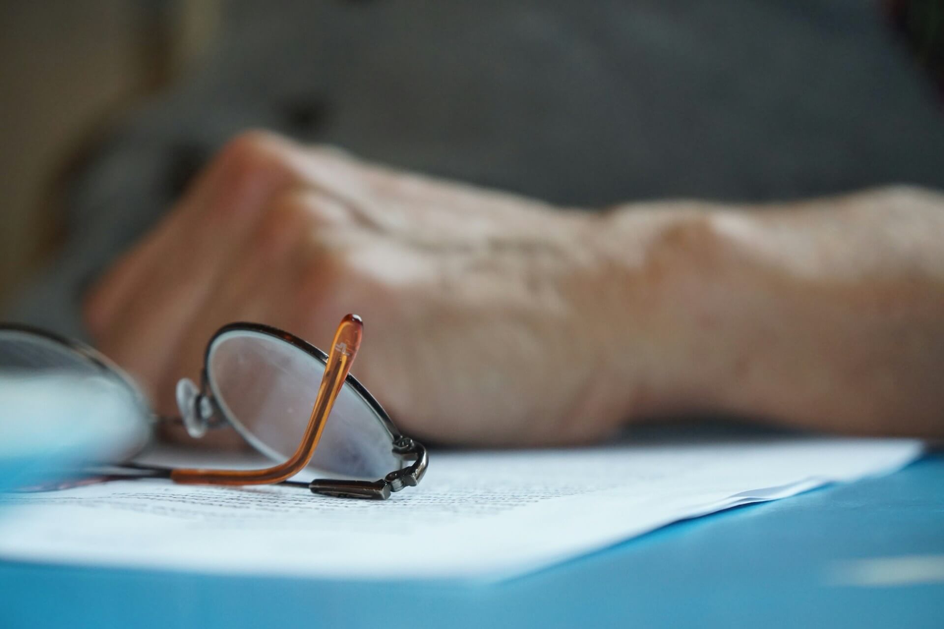 Glasses and legal forms.